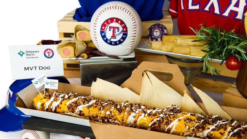 Meet the Most Valuable Tamale (M.V.T.): A 2-ft tamale filled with the legendary Boomstick hot dog, topped with Texas chili and nacho cheese. Served at Globe Life  Park in Arlington.