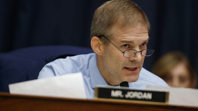 In this Thursday, July 12, 2018, photo, Rep. Jim Jordan, R-Ohio, questions FBI Deputy Assistant Director Peter Strzok during the House Committees on the Judiciary and Oversight and Government Reform hearing on “Oversight of FBI and DOJ Actions Surrounding the 2016 Election,” on Capitol Hill in Washington. Jordan, who coached wrestling at Ohio State University, has been interviewed by the law firm investigating allegations that a now-dead team doctor sexually abused male athletes there decades ago. Jordan’s spokesman says the congressman spoke Monday, July 16, 2018, with the firm looking into allegations against Dr. Richard Strauss and how the school responded to any complaints about Strauss. (AP Photo/Evan Vucci, File)