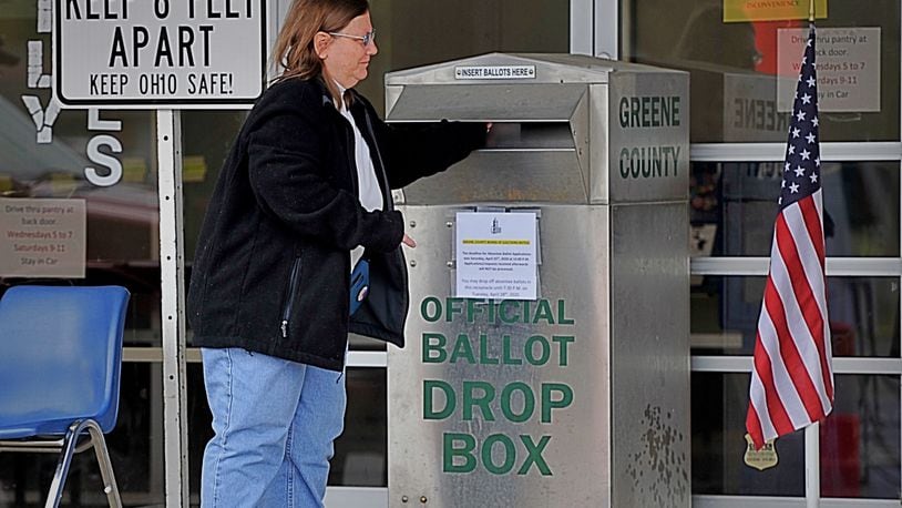Voters use the drop box at the Greene County Board of elections in this April 2020 image. Staff photo by Marshall Gorby.