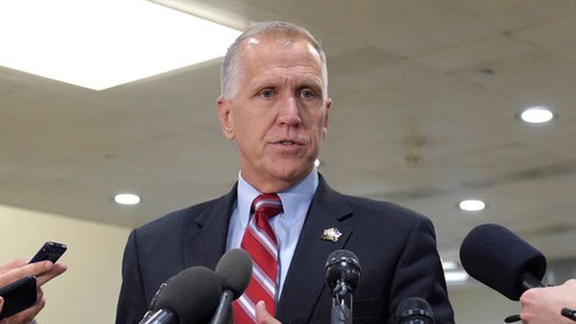FILE - In this April 7, 2017 file photo, Sen. Thom Tillis, R-N.C., speaks to reporters on Capitol Hill in Washington. Tillis collapsed Wednesday, May 17, 2017, during Washington race, received CPR, as was taken away in ambulance. (AP Photo/Susan Walsh, File)