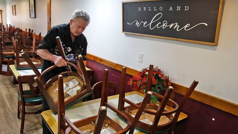 Fred Stegner takes down the chairs at the Springfield Soup Kitchen Tuesday, Jan. 2, 2023. A Posada, a vibrant and symbolic Christmas celebration that holds a prominent place in Mexican culture, will be held at the Soup Kitchen on Jan. 10. BILL LACKEY/STAFF