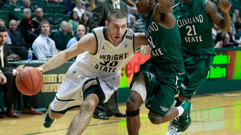 Joe Bramanti (30) of Wright State is guarded by Charlie Lee (31) of Cleveland State during Wednesday's basketball game at the E.J. Nutter Center in Dayton on Jan. 9, 2013. Wright State won the game 69-53. Photo by Barbara J. Perenic/Cox Media Group