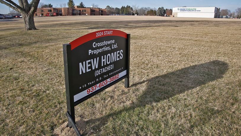 Crosstowne Properties, Ltd. is building 50 new homes at the site of the former Mercy Hospital on North Fountain Avenue and 100 at the site of the former Jefferson School. BILL LACKEY/STAFF