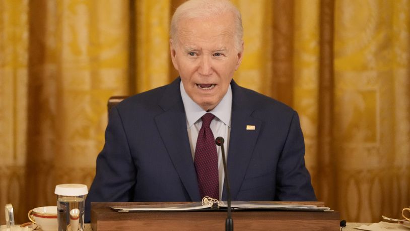 President Joe Biden speaks during a trilateral meeting with Philippine President Ferdinand Marcos Jr. and Japanese Prime Minister Fumio Kishida in the East Room of the White House in Washington, Thursday, April 11, 2024. (AP Photo/Mark Schiefelbein)