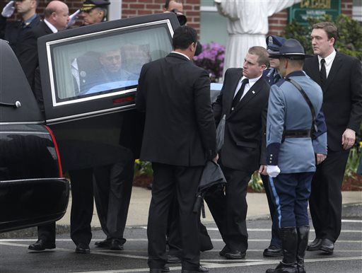 Funerals held for young bomb victim, slain officer