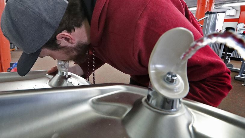 Codey Adams gets a drink from the drinking fountain at Springfield Health and Fitness. The Clark County Combined Health District will seek to ask voters to put adding fluoride to Springfield’s water system on the ballot in May or November. Bill Lackey/Staff