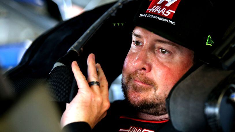 DAYTONA BEACH, FL - FEBRUARY 10: Kurt Busch, driver of the #41 Haas Automation/Monster Energy Ford, sits in his car during practice for the Monster Energy NASCAR Cup Series Daytona 500 at Daytona International Speedway on February 10, 2018 in Daytona Beach, Florida. (Photo by Jerry Markland/Getty Images)