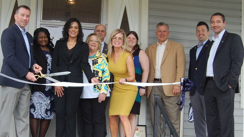 The ribbon cutting for the law firm took place on Thursday, April 25.