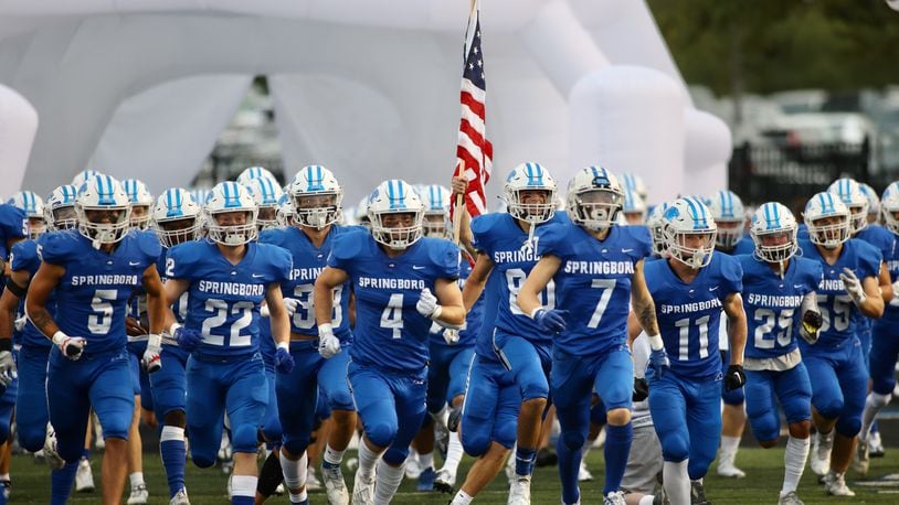 Springboro takes the field before a game against Centerville on Friday, Sept. 23, 2022, at CareFlight Field in Springboro. David Jablonski/Staff