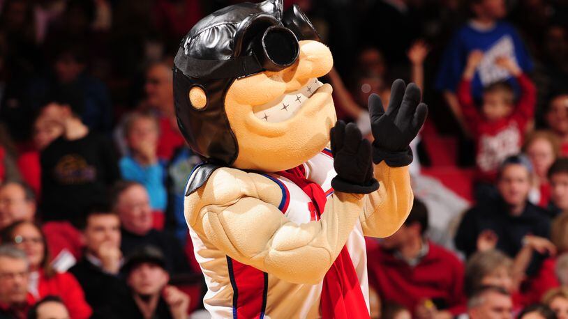 Dayton’s Mascot Rudy tries to pump up the fans against Duquesne at UD arena. PHOTO ERIK SCHELKUN