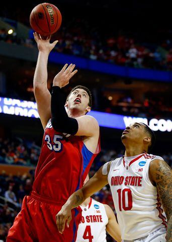 Dayton Flyers defeat the Ohio State Buckeyes in the second round of the 2014 NCAA Men's Basketball Tournament