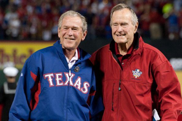 2010: Former United States Presidents George W. Bush and George Bush Sr. are seen on the field prior to Game Four of the 2010 World Series