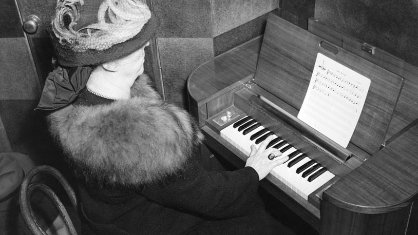 Edith Deeds playing the Deeds Carillon organ. CONTRIBUTED PHOTO, DAYTON HISTORY