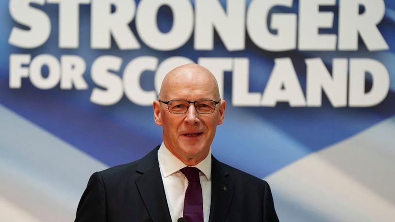 Newly elected leader of the Scottish National Party (SNP) John Swinney delivers his acceptance speech at the Advanced Research Centre (ARC) of the Glasgow University, in Glasgow, Monday, May 6, 2024, after he was confirmed as the SNP's new leader. (Jane Barlow/PA via AP)