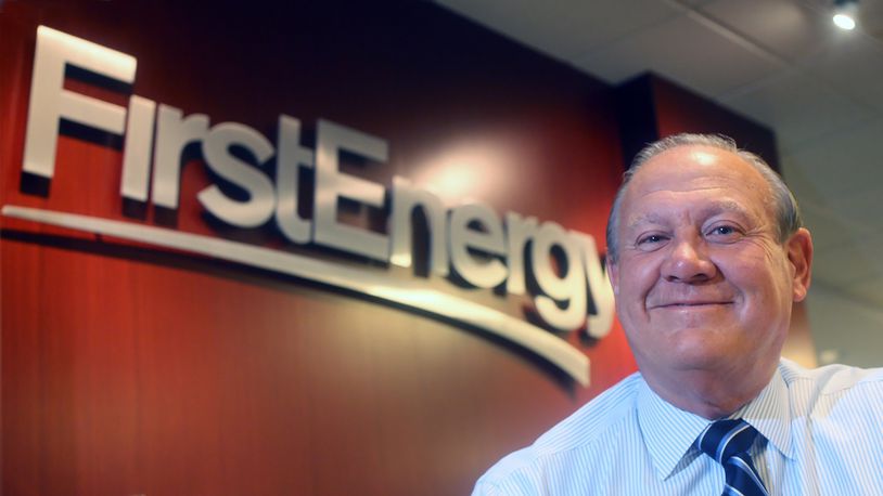 FILE - In this 2015 file photo, FirstEnergy Corp. President and CEO Charles "Chuck" Jones appears at the company's Akron, Ohio headquarters. Federal authorities say FirstEnergy bankrolled an alleged $60 million bribery scheme to win a legislative bailout for two Ohio nuclear plants approved in the Ohio Legislature. Two attorneys, under order from a federal judge to reveal the names, wrote in a court document that former FirstEnergy CEO Chuck Jones and senior vice president Michael Dowling were responsible for the company's role. (Phil Masturzo/Akron Beacon Journal via AP, File)