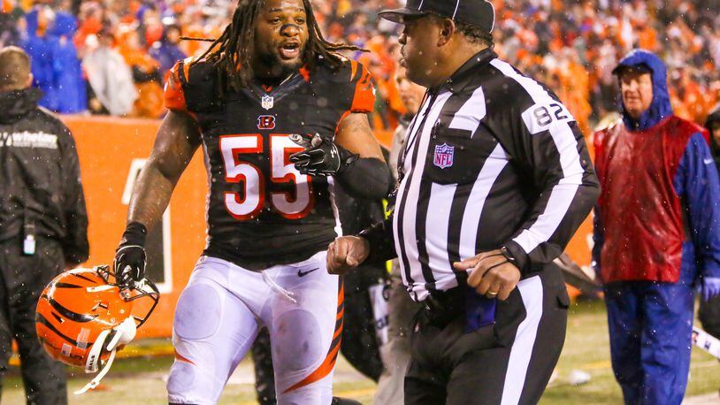 Bengals linebacker Vontaze Burfict pleads his case to an official after the Steelers’ 18-16 win in the wild card playoff game at Paul Brown Stadium in Cincinnati on Saturday, Jan. 9 GREG LYNCH / STAFF