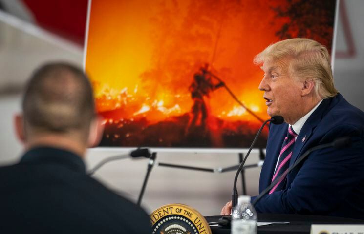 President Donald Trump attends a briefing about wildfires in California at the Sacramento McClellan Airport in McClellan Park, Calif., Monday, Sept. 14,  2020. (Doug Mills/The New York Times)