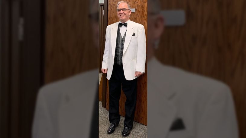 School bus driver Bob Walford donned a tuxedo while treating students to animal crackers and water Tuesday. (Photo: Zionsville Community Schools)