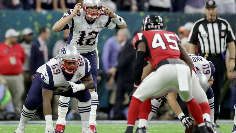 HOUSTON, TX - FEBRUARY 05: Tom Brady #12 of the New England Patriots in action against the Atlanta Falcons during Super Bowl 51 at NRG Stadium on February 5, 2017 in Houston, Texas. (Photo by Ronald Martinez/Getty Images)