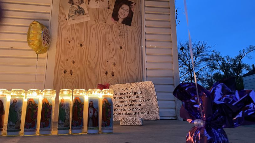 A candlelight vigil was held on Monday in memory of a Springfield woman who was found dead in a duplex on North Douglas Avenue last week.