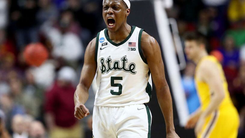 Cassius Winston #5 of the Michigan State Spartans celebrates a basket against the Minnesota Golden Gophers during the second half in the second round game of the 2019 NCAA Men’s Basketball Tournament at Wells Fargo Arena on March 23, 2019 in Des Moines, Iowa. (Jamie Squire/Getty Images/TNS) *FOR USE WITH THIS STORY ONLY*