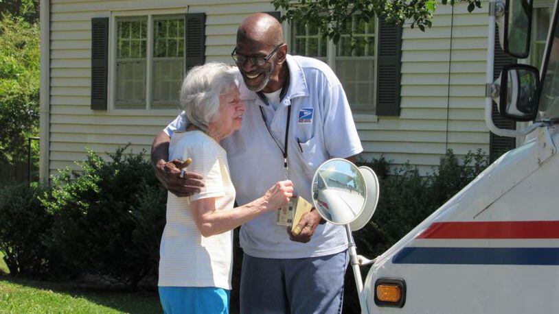Floyd Martin delivered the mail, and so much more, during his nearly 35 years as a mailman. Lorraine Wascher was one of the many residents who waited for him during his last week, to say thank you.