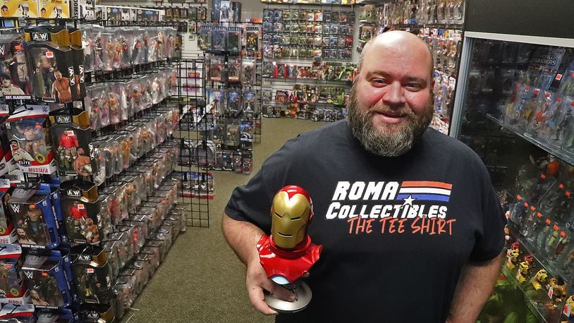 Aaron Detrick, the owner of Roma Collectibles The Toy Store, has thousands of toys in his new store on Upper Valley Pike. BILL LACKEY/STAFF