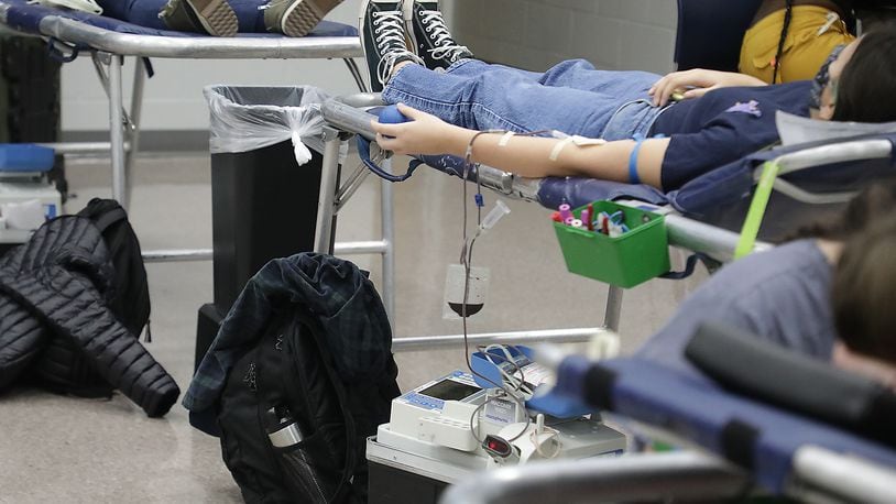 The Community Blood Center is hosting several drives this month to help with the blood shortage. Here, students and staff at Springfield High School held a blood drive for the Community Blood Center where they had 80 donors give blood. BILL LACKEY/STAFF