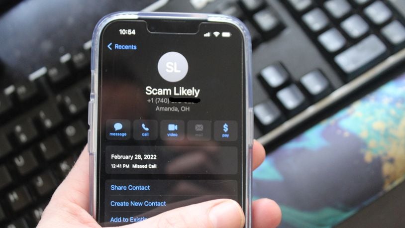 Smart phones sometimes give notice that a call might be from a scammer. CORNELIUS FROLIK / STAFF