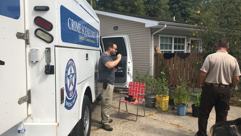 The Ohio Bureau of Criminal Investigation conducted a search of an apartment on Hunter Road in Enon as part of the unsolved homicide of Leonid Clark. Greene County Capt. Sean Magoteaux said the residents of that apartment are not considered suspects in the case. RICHARD WILSON/STAFF