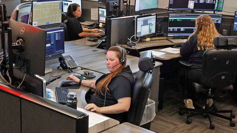Dispatchers in the new 9-1-1 Communication Center at work Friday, August 25, 2023. BILL LACKEY/STAFF
