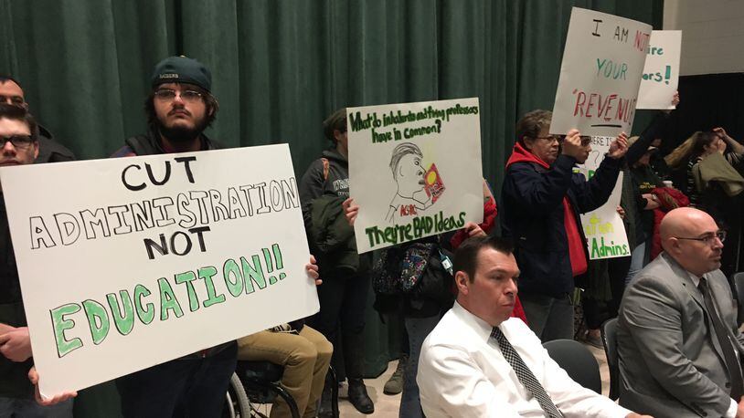 Wright State University students protested on Friday, April 7, 2017, during a board of trustees meeting. Students held signs that read “Cut Administration Not Education.” Another protest is planned for the May 19 finance committee meeting. JOSH SWEIGART / STAFF