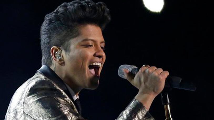 Bruno Mars performs during the halftime show of the NFL Super Bowl XLVIII football game Sunday, Feb. 2, 2014, in East Rutherford, N.J. (AP Photo/Julio Cortez)