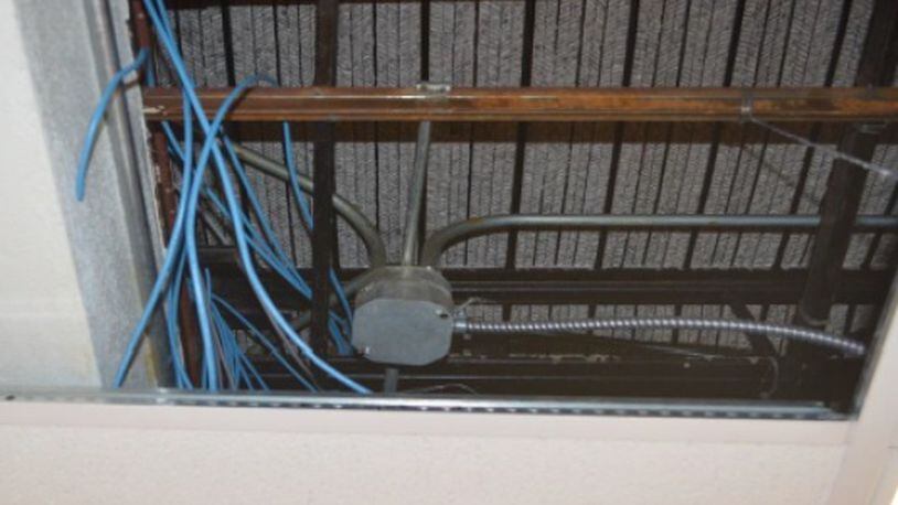 The two computers used by Marion Correctional Institution inmates was found in this ceiling of a training room.(Photo: Submitted / Ohio Inspector General)