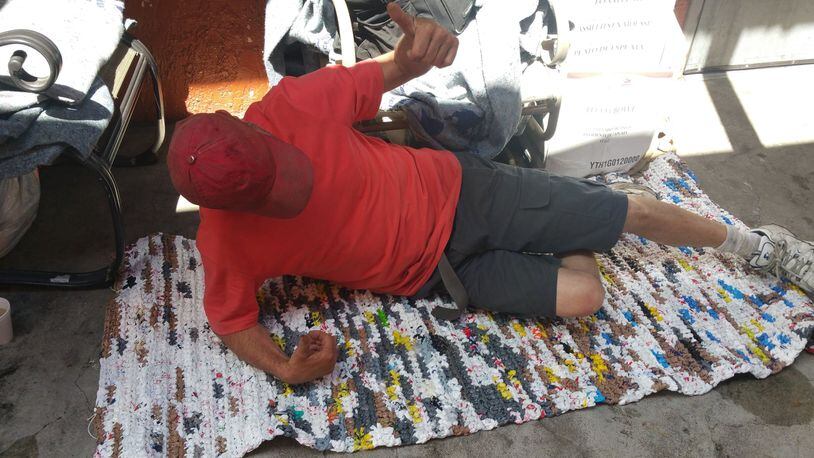A man tries out his the mats made for the soup kitchen. Contributed photo