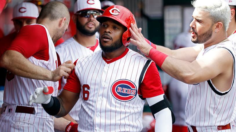 CINCINNATI, OH - JULY 21: Phillip Ervin #6 of the Cincinnati Reds celebrates in the dugout after hitting a solo home run in the eighth inning against the St. Louis Cardinals at Great American Ball Park on July 21, 2019 in Cincinnati, Ohio. The Cardinals won 3-1. (Photo by Joe Robbins/Getty Images)