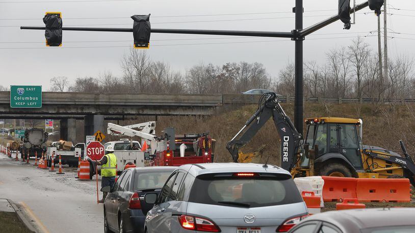 A file photo of the Ohio Department of Transportation installing traffic signals at the intersection of I-70 and South Limestone Street. Bill Lackey/Staff