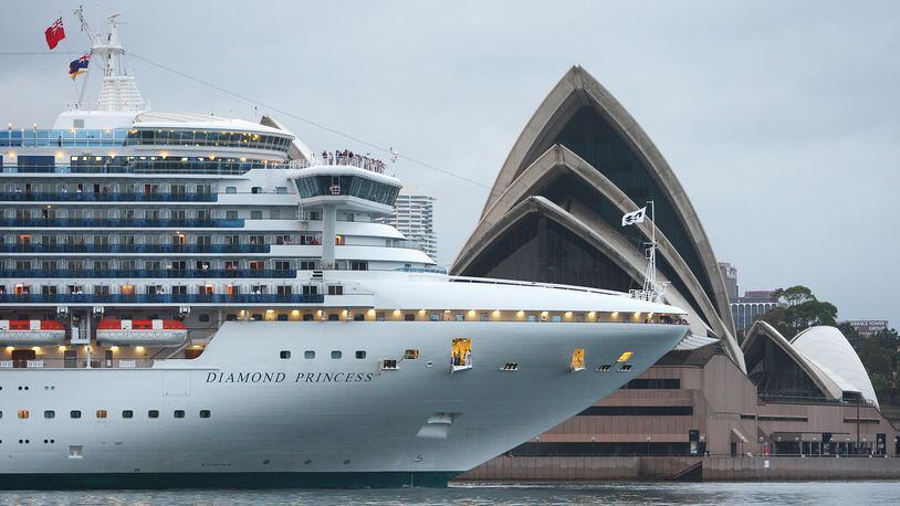 SYDNEY, AUSTRALIA - DECEMBER 10: The Diamond Princess cruise ship sails past the Sydney Opera House in Sydney Harbour on December 10, 2009 in Sydney, Australia. The Diamond Princess was followed by the Pacific Jewel on its maiden voyage and the Sun Princess. All three cruise ships arrived in Sydney harbour within an hour of each other as the industry continues to thrive. (Photo by Cameron Spencer/Getty Images)