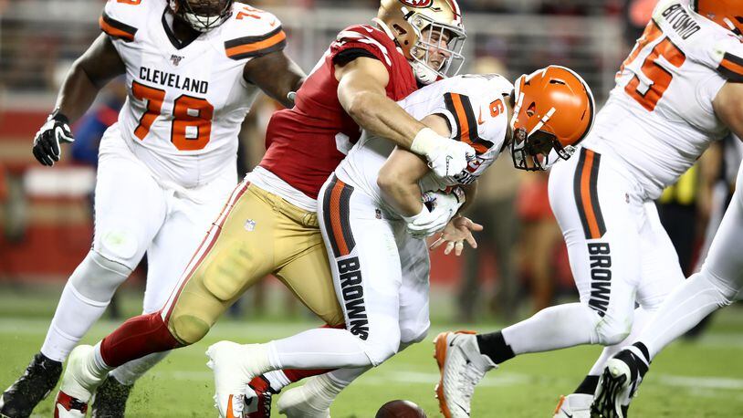 SANTA CLARA, CALIFORNIA - OCTOBER 07:  Nick Bosa #97 of the San Francisco 49ers sacks Baker Mayfield #6 of the Cleveland Browns and forces a fumble at Levi's Stadium on October 07, 2019 in Santa Clara, California. (Photo by Ezra Shaw/Getty Images)