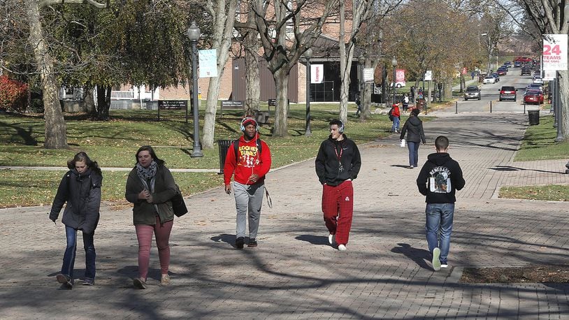 Wittenberg University students walk across campus Monday. According to University President Mike Frandsen, the key to Wittenberg’s future in boosting enrollment. Bill Lackey/Staff