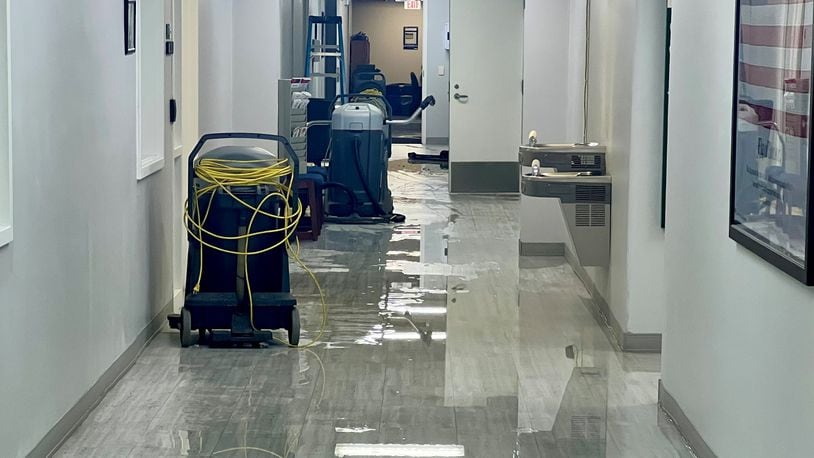 Flooding at Springview Government Center was caused by a water pipe that burst near the men's restroom on the first floor. CONTRIBUTED