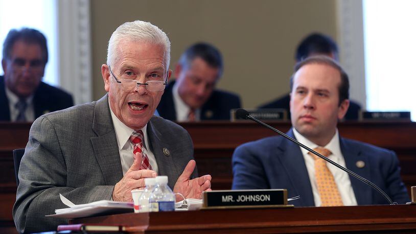U.S. Rep. Bill Johnson (L) (R-OH) speaks as Rep. Jason Smith (R) (R-MO) looks on during a House Budget Committee markup of the Republican health care bill on Capitol Hill on March 16, 2017 in Washington, DC.