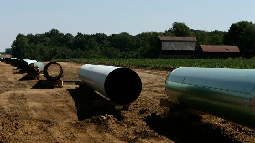 Pipe laid out in Central Indiana farmland on its way to Ohio in 2008. The $5 billion project was built to move natural gas from the Rocky Mountains to Ohio. Jim Noelker/Dayton Daily News
