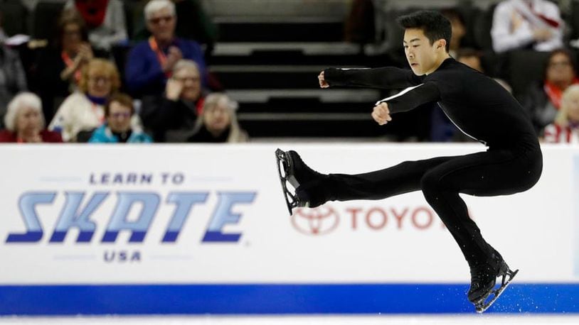 FILE - In this Jan. 4, 2018, file photo, Nathan Chen performs during the men's short program at the U.S. Figure Skating Championships in San Jose, Calif. At 18 and already a two-time national champion, Chen is the favorite for the Pyeongchang Games. (AP Photo/Marcio Jose Sanchez, File)