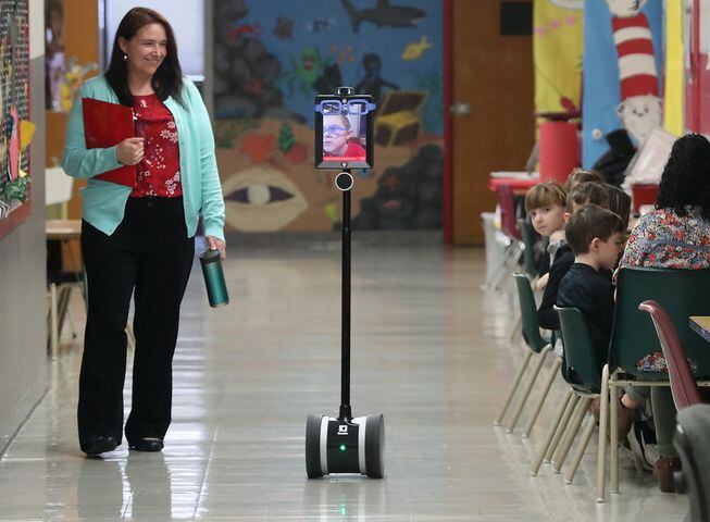 PHOTOS: Robot Helps Boy Attend School