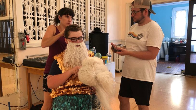 Stephanie Jenkins and Justin Hoke use a beard and wig to transform Adam Chesshir into King Triton for the Ohio Performing Arts Institute's production of "Disney's The Little Mermaid, Jr." The show, presented by the Ohio Performing Arts Institute, will be Friday and Saturday at the John Legend Theater.