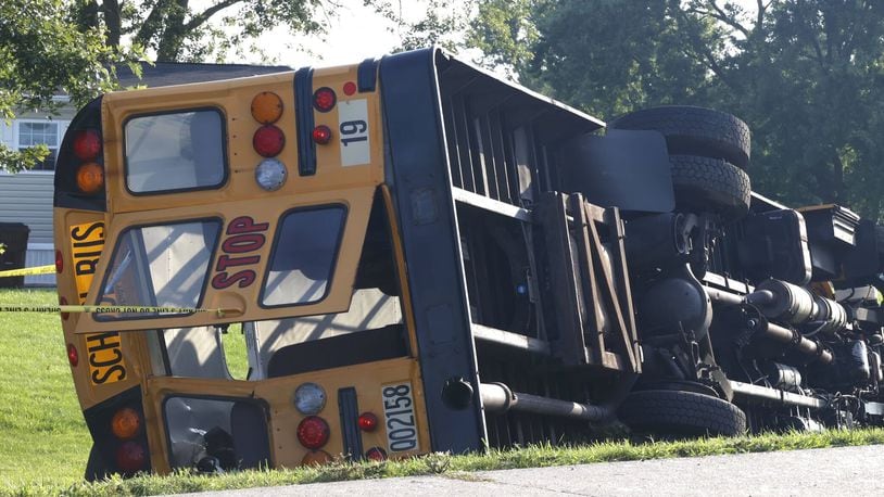 At least one person was killed after a Northwestern school bus was involved in a crash on Route 41 in German Twp. Tuesday, Aug. 22, 2023. BILL LACKEY/STAFF
