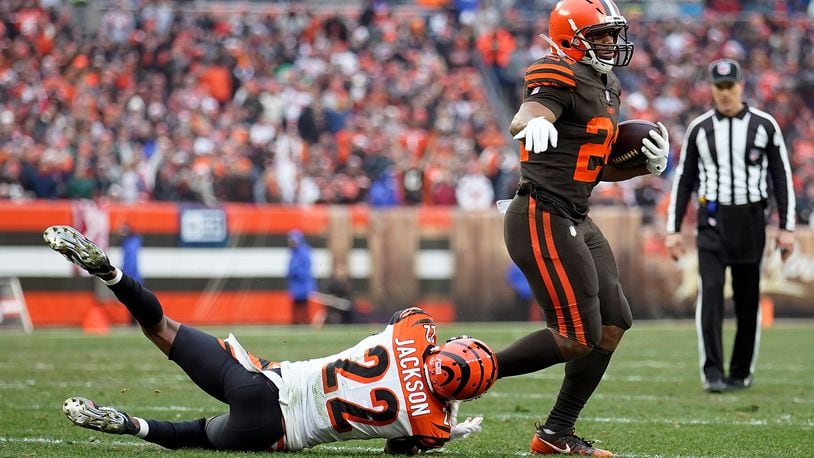 Nick Chubb of the Cleveland Browns avoids a tackle by William Jackson of the Cincinnati Bengals during the second quarter at FirstEnergy Stadium on December 23, 2018 in Cleveland, Ohio. (Photo by Kirk Irwin/Getty Images)