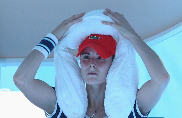 Players, fans battle heat wave at Australian Open