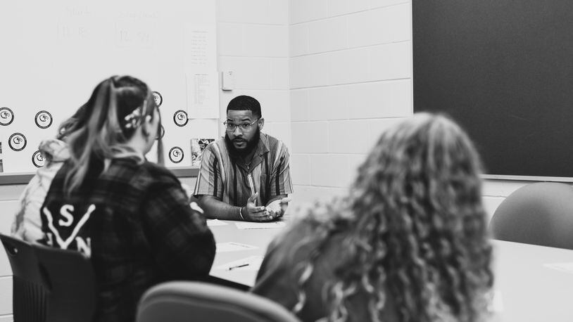 Clark State College's Khalil Scott, admissions specialist, in a mentoring session. Contributed